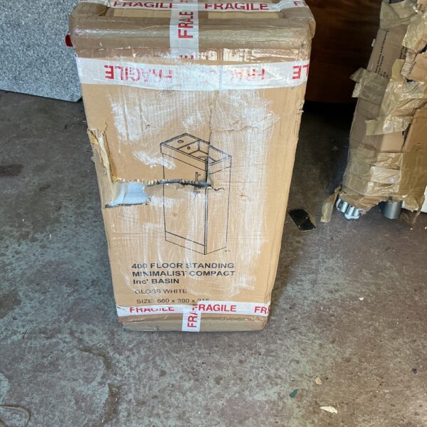 Floor standing wash basin cabinet in original packaging.