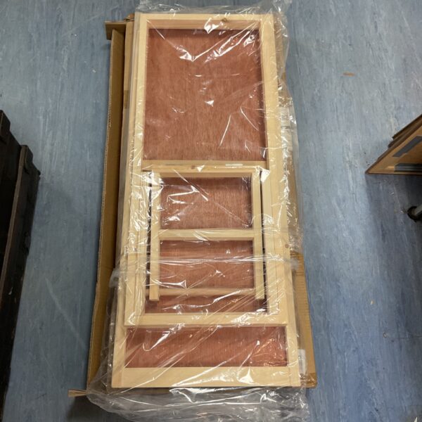 Wooden folding dog ramp for pet access.