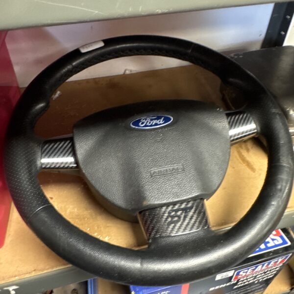 Used Ford Focus ST steering wheel with leather grip.