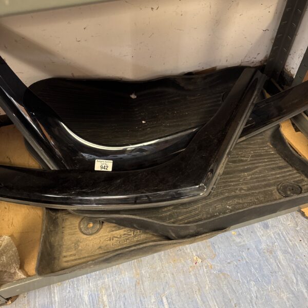 Used Ford Transit Connect floor mats with wind deflectors.
