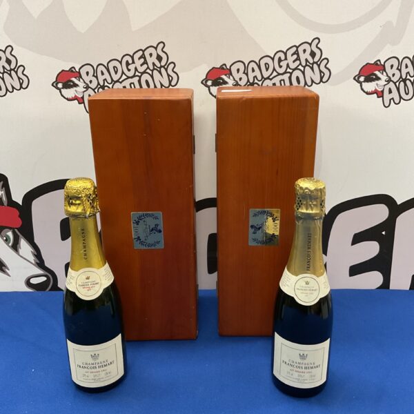 Francois Hemart champagne bottles with Ritz anniversary boxes.