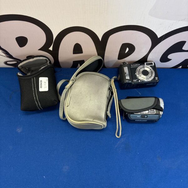 Fujifilm FinePix E900 digital camera in protective case.
