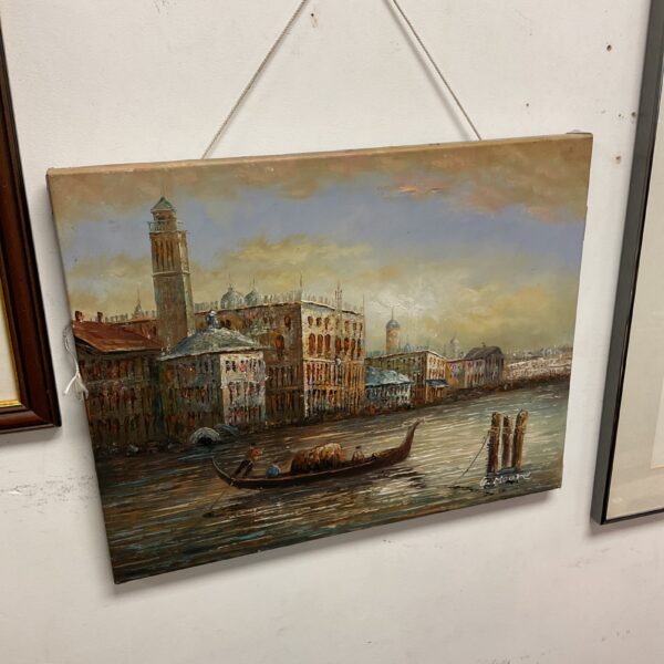 Signed G Moore oil painting of a Venetian gondola on the canals.