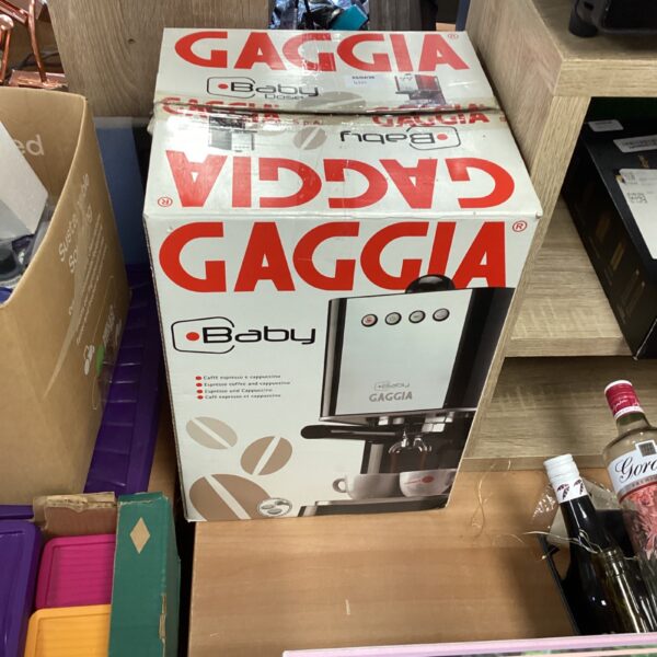 Boxed Gaggia Baby coffee machine in original packaging.