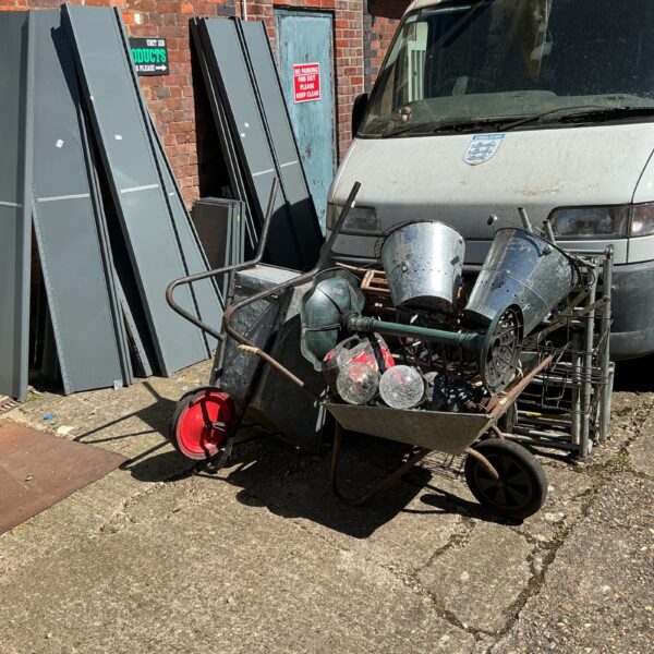 Galvanised wheelbarrow from a shed clearance, ideal for garden work.