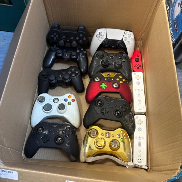 Selection of Xbox and PlayStation gaming controllers for console gaming.
