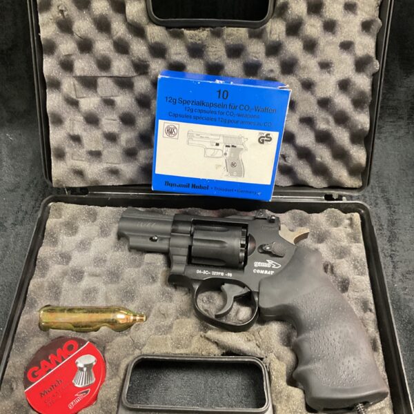 Gamo R77 air pistol with box of CO2 capsules for operation.