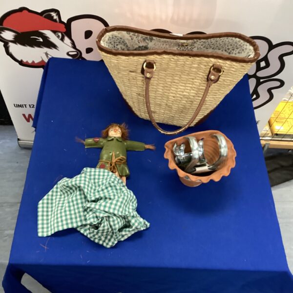 Garden decor collection featuring woven basket and wall planter.