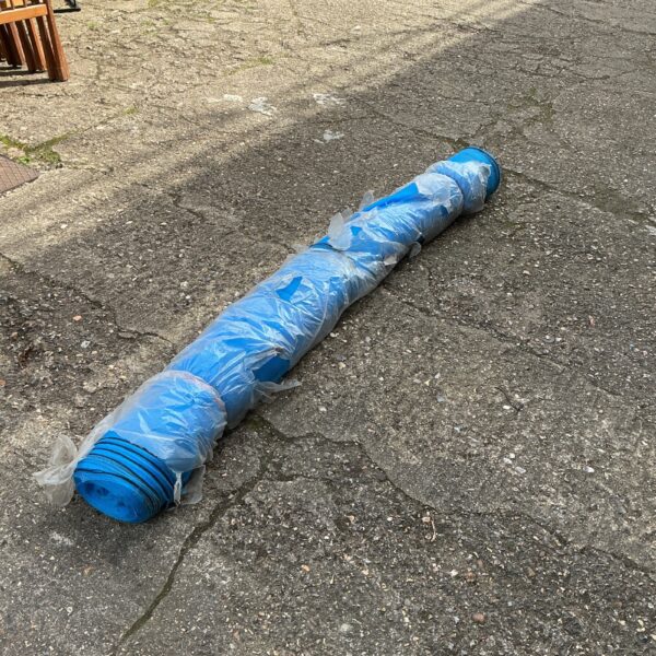 Roll of garden pond mesh for fish protection and landscaping.