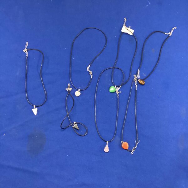 Colourful gemstone necklaces in a jewellery lot.