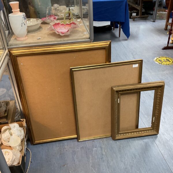 Lot of three vintage gilt picture frames for wall decor.