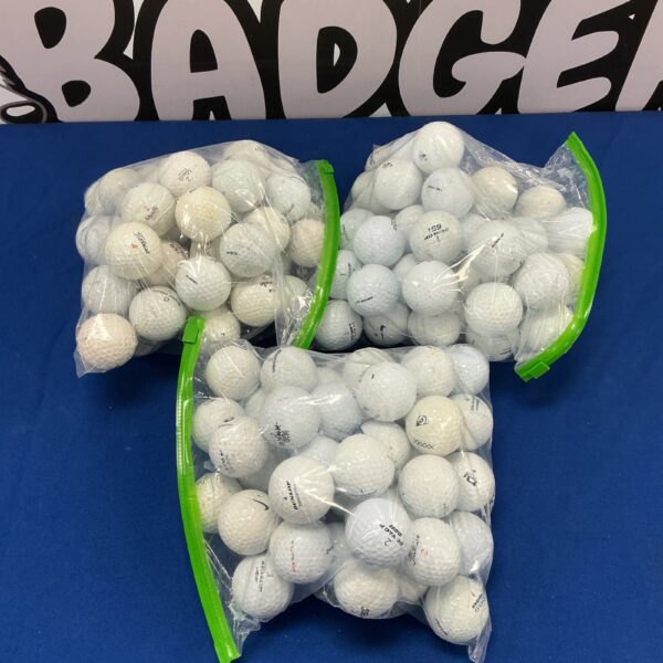 Large lot of used Titleist and Dunlop golf balls for practice.