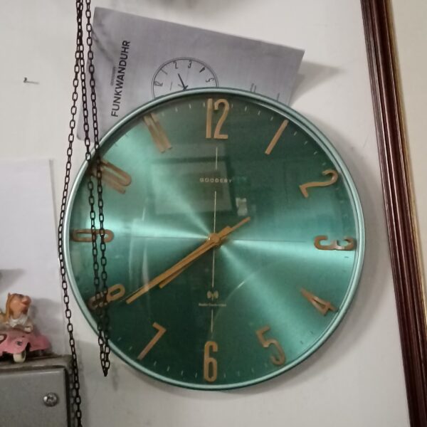 Modern Goodery radio controlled wall clock for accurate timekeeping.