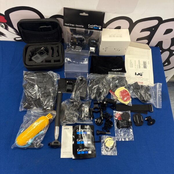 GoPro HERO5 Black action camera with included accessories and case.