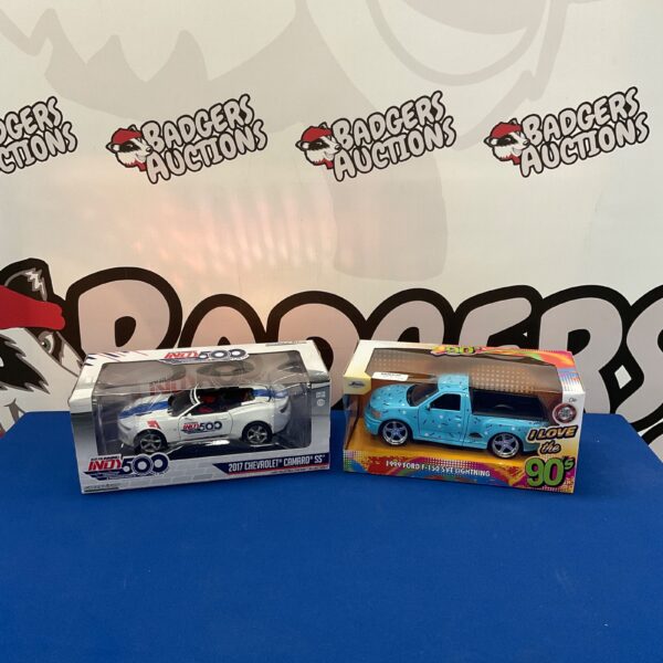 GreenLight Collectibles diecast cars, 2017 Camaro SS and 1999 Ford F-150.
