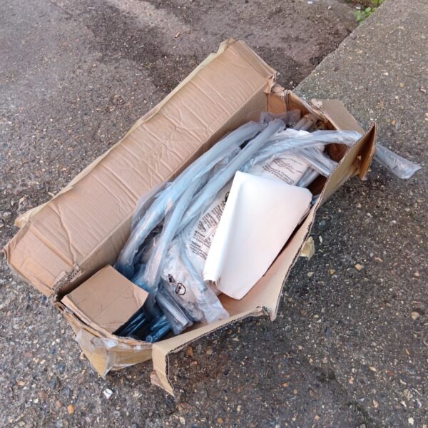 Unused grey metal canopy still in its original box.