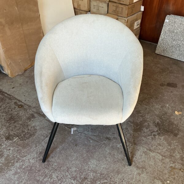 Grey modern accent chair with black wooden legs.