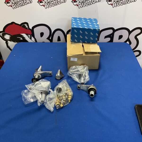 Assorted Grohe faucet parts for repair and restoration projects.