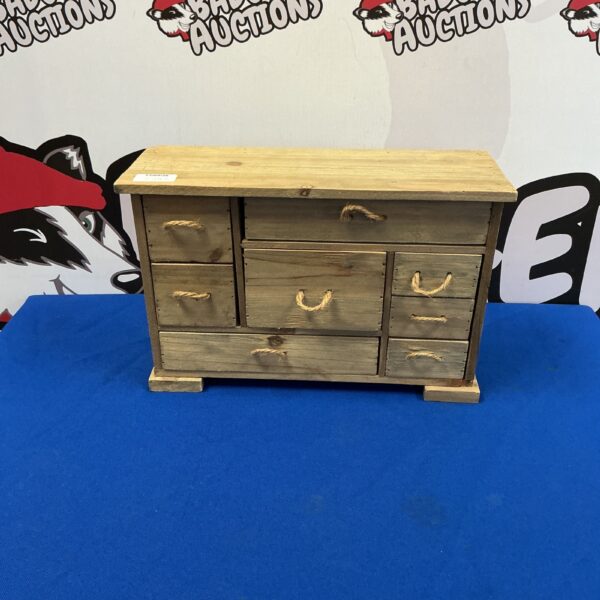 Rustic handcrafted jewellery box with three drawers.