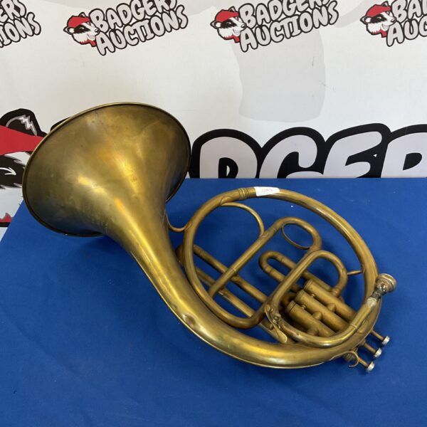 Vintage Hawkes Excelsior piston horn in brass, side view.