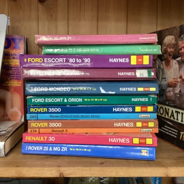 Bundle of Haynes manuals including Ford Escort and Mondeo repair guides.