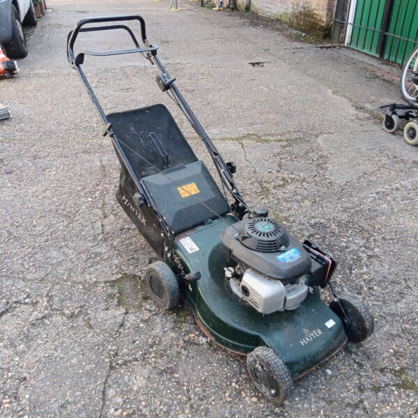 Hayter Motif 48 petrol mower in used condition for garden maintenance.