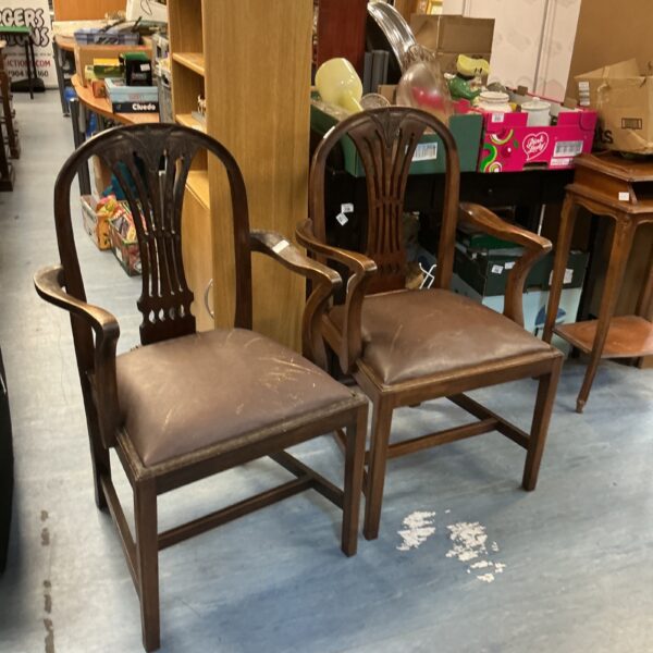 Pair of antique Hepplewhite style dining chairs with upholstered seats.