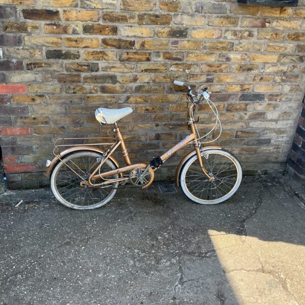 Vintage Hercules folding bike in a retro style.
