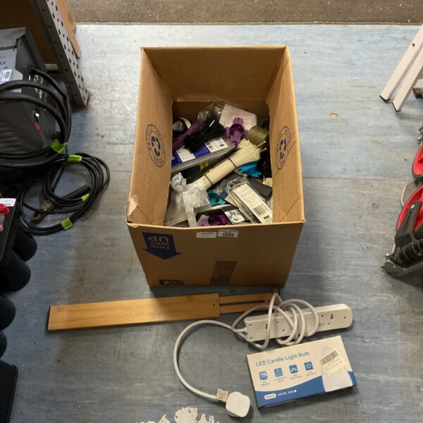 Mixed lot of home storage and lighting accessories in a cardboard box.