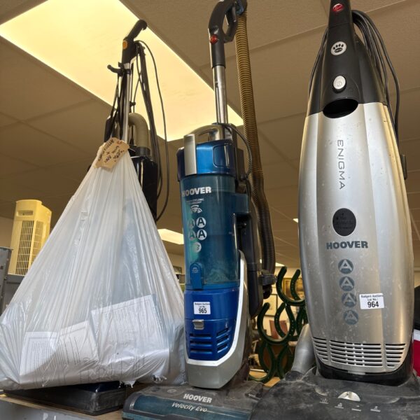 Used Hoover Velocity Evo upright vacuum cleaner in a domestic setting.