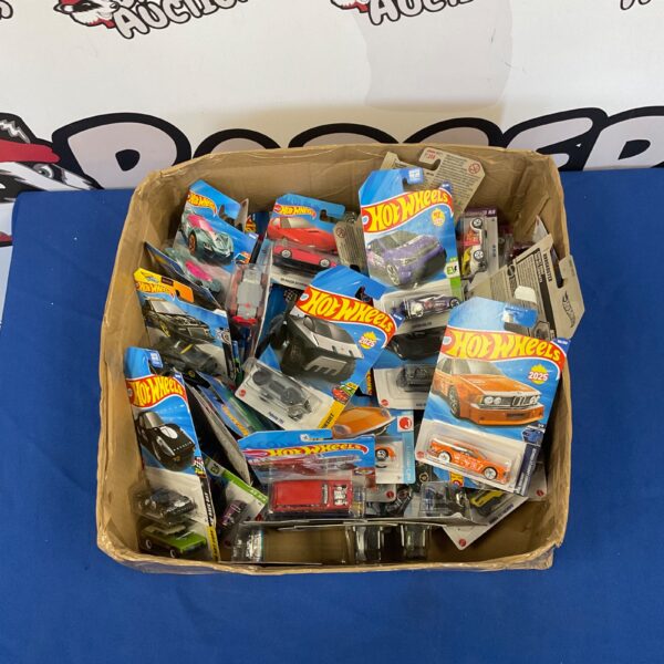 A box of unopened Hot Wheels model cars.