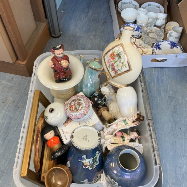 House clearance lot featuring porcelain figurines and decorative vases.