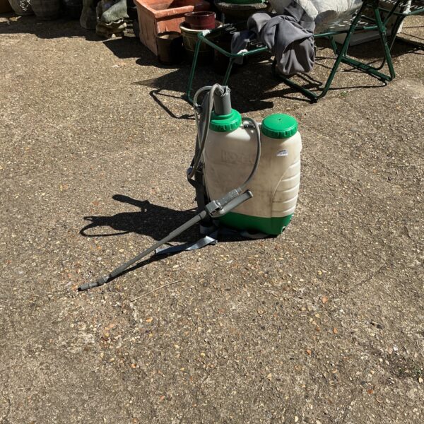 Vintage Hozlock knapsack sprayer for garden and plant care.