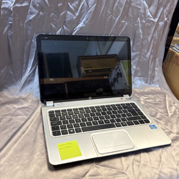 Front view of used HP laptop model 41203SA.