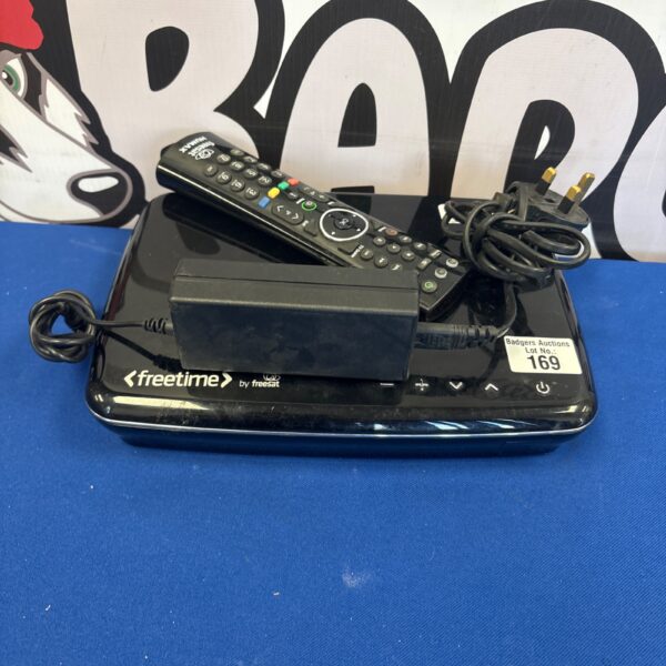 Humax Freesat HDR-1100S receiver with remote control and power cable.
