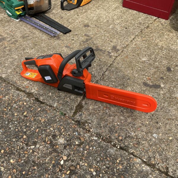 Used Husqvarna petrol chainsaw for garden and forestry work.
