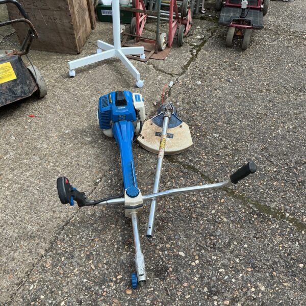 Used Hyundai petrol strimmer for garden maintenance and landscaping.