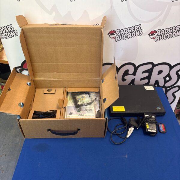 Boxed vintage IBM Thinkpad 600E laptop with accessories.
