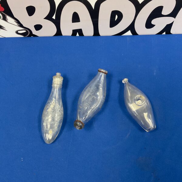 Three antique glass baby feeding bottles