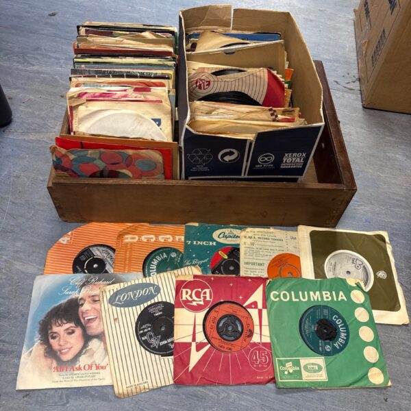 Two boxes of mixed 7’ vinyl records inc cliff richard