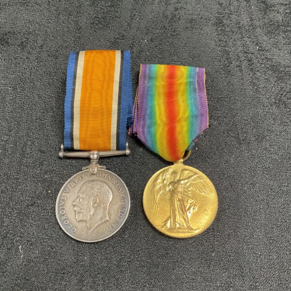 Pair of WW1 Medals 1914-1918 silver medal and victory medal Pte Livesey Manchester regiment
