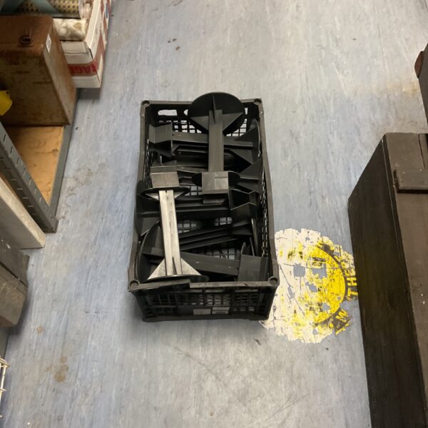 Crate of industrial construction components, plastic building parts.