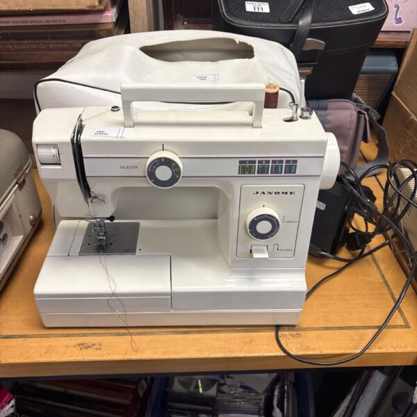 Vintage Janome 106 domestic sewing machine in good condition.