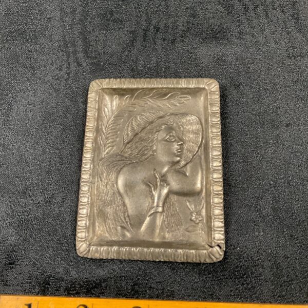 Vintage Japanese Art Deco pin tray with embossed floral design.