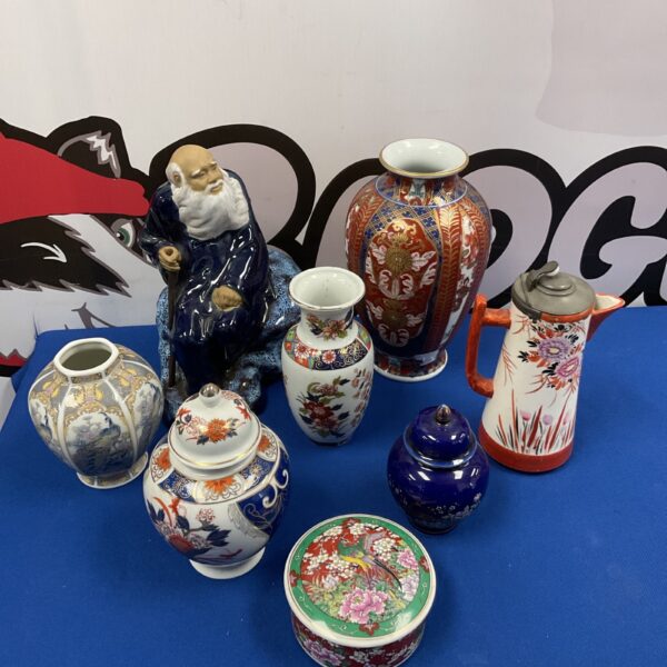 Collection of antique Japanese and Chinese porcelain vases and jars.