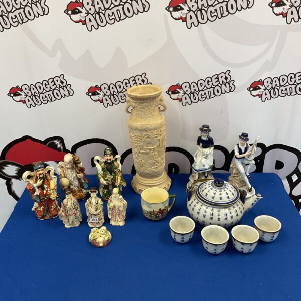Vintage Japanese collectibles lot featuring figurines, teaset, and vase.