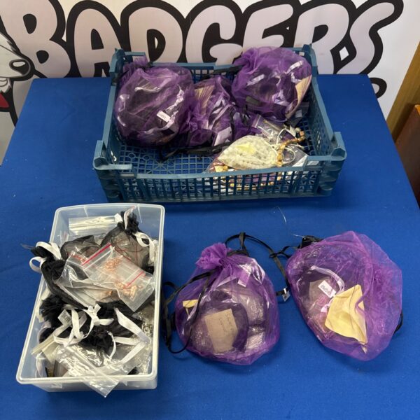 Mixed lot of colourful jewellery making supplies and beads.