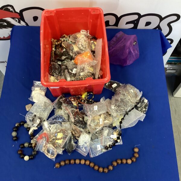Mixed lot of jewellery making supplies with beads and gemstones.