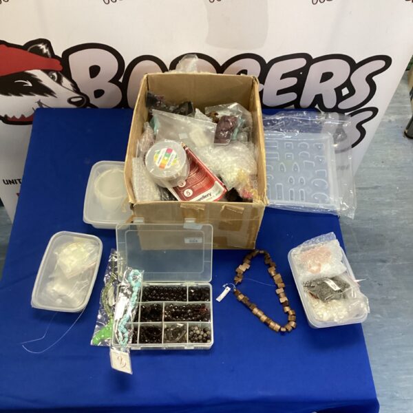 Mixed lot of jewellery making supplies with beads and wire.