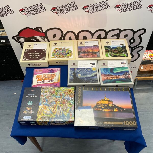 Overview of a lot of jigsaw puzzles including Wentworth and Gibsons.